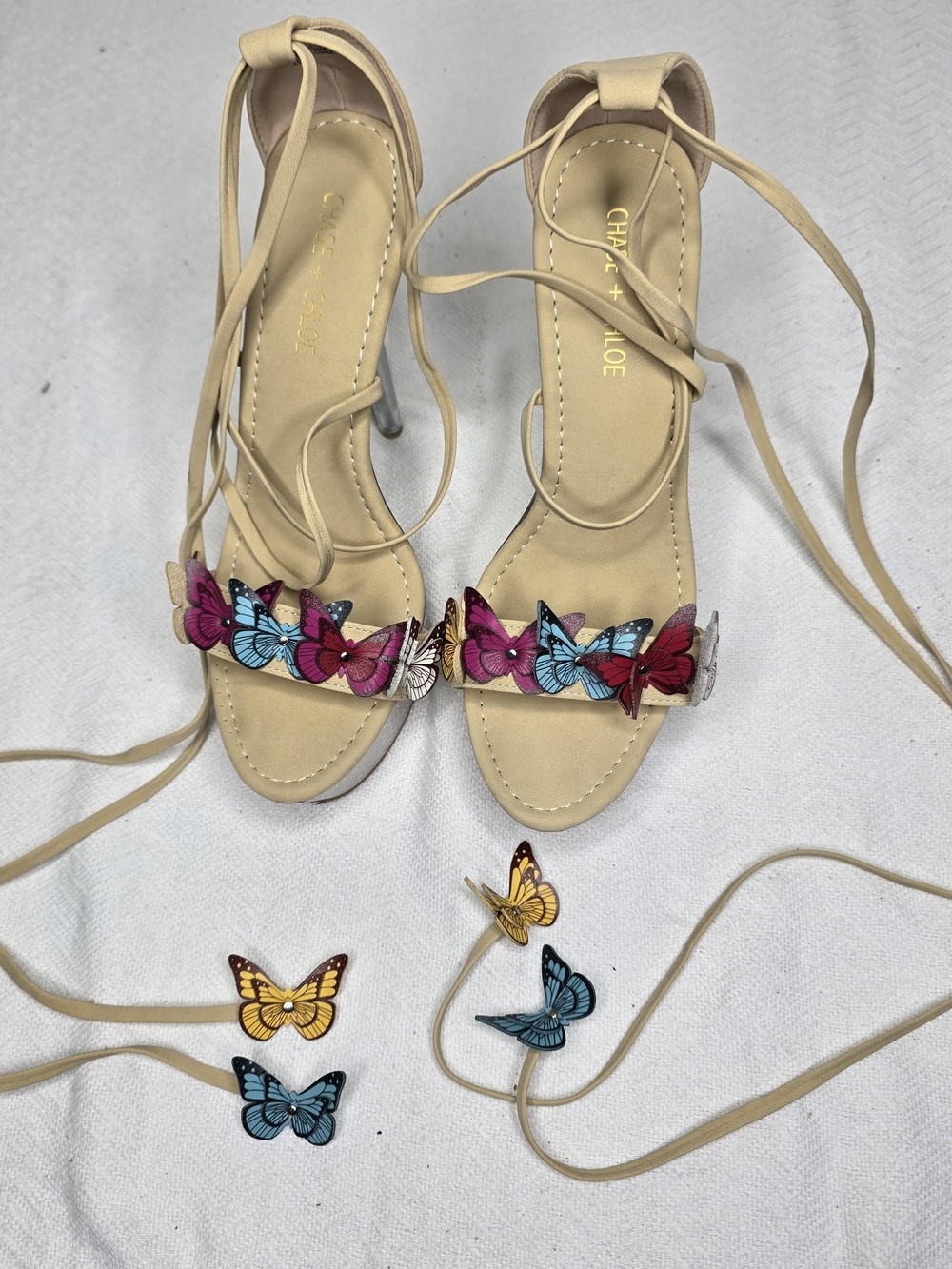 Chase + Chloe Beige Lace-Up Heels with Pink & Blue Butterfly Accent